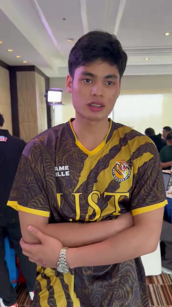 JJ Macam of UST looks forward to competing against the club teams. # ...