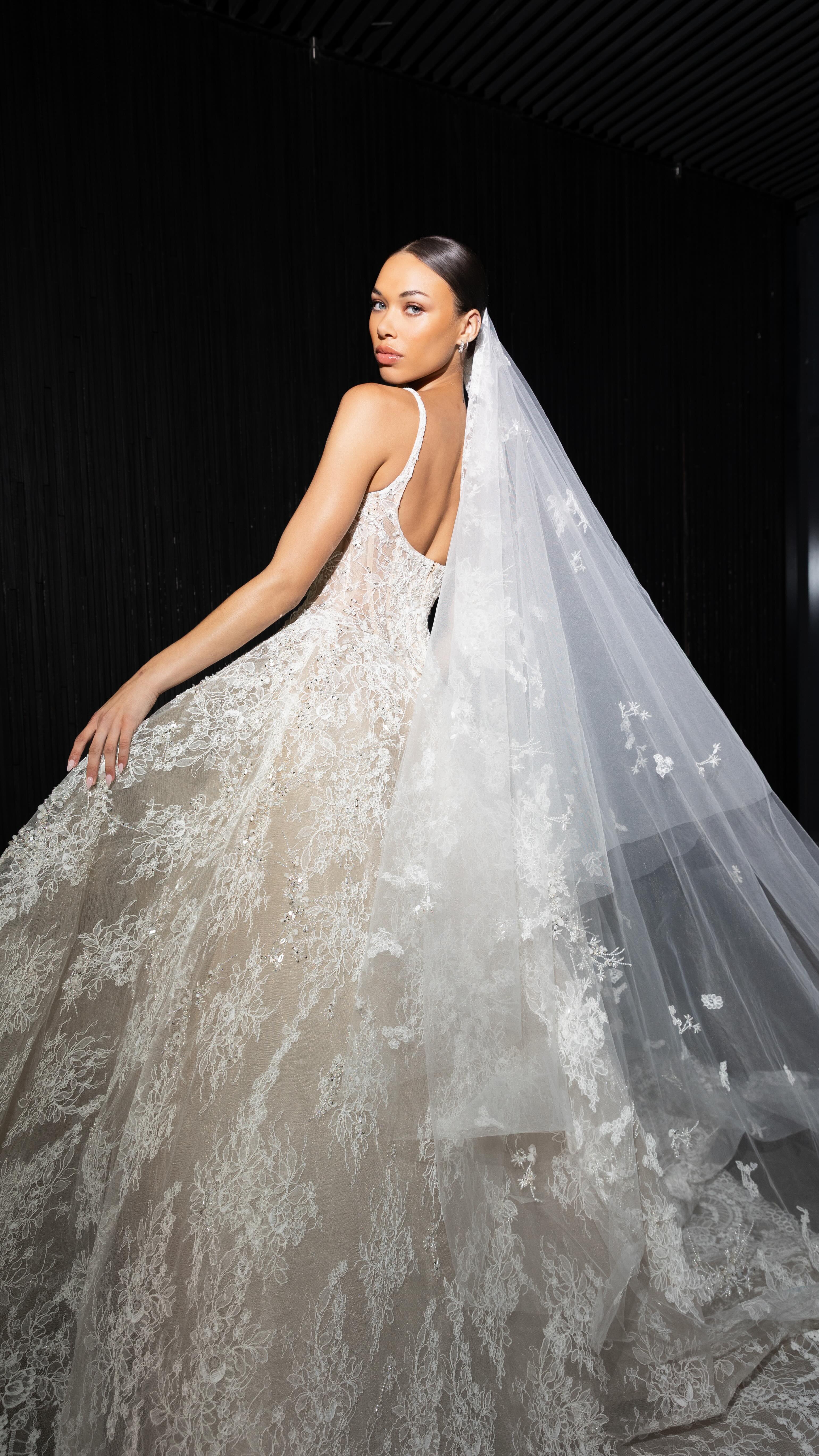 Nicole and Felicia SS 2026 / Style NF121 A true show stopper. The unique scoop neckline on this full sequin sheath gown are perfectly designed to enhance the fitted look. The dress