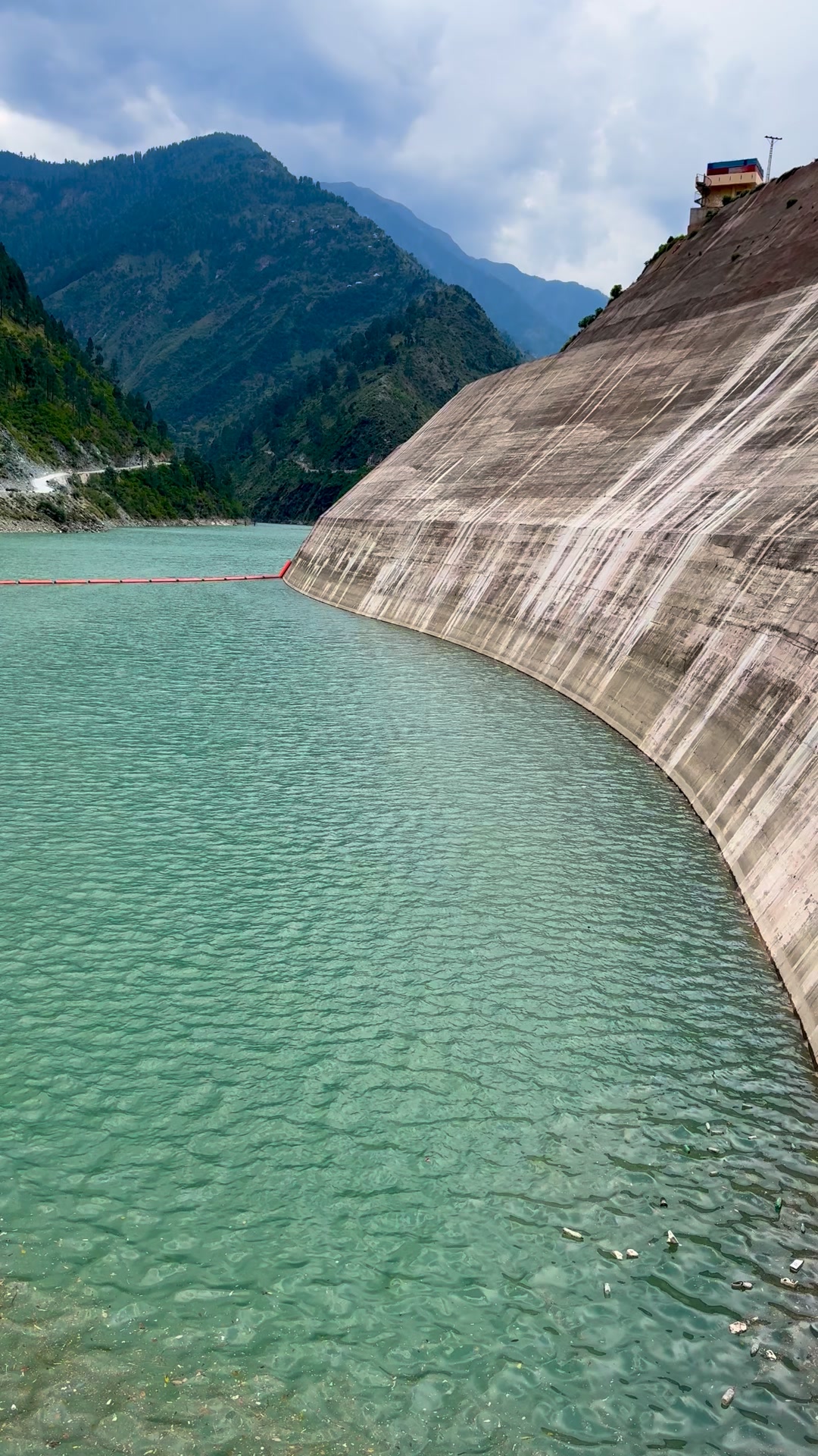 Controlled release of water through a flap gate helps regulate ...