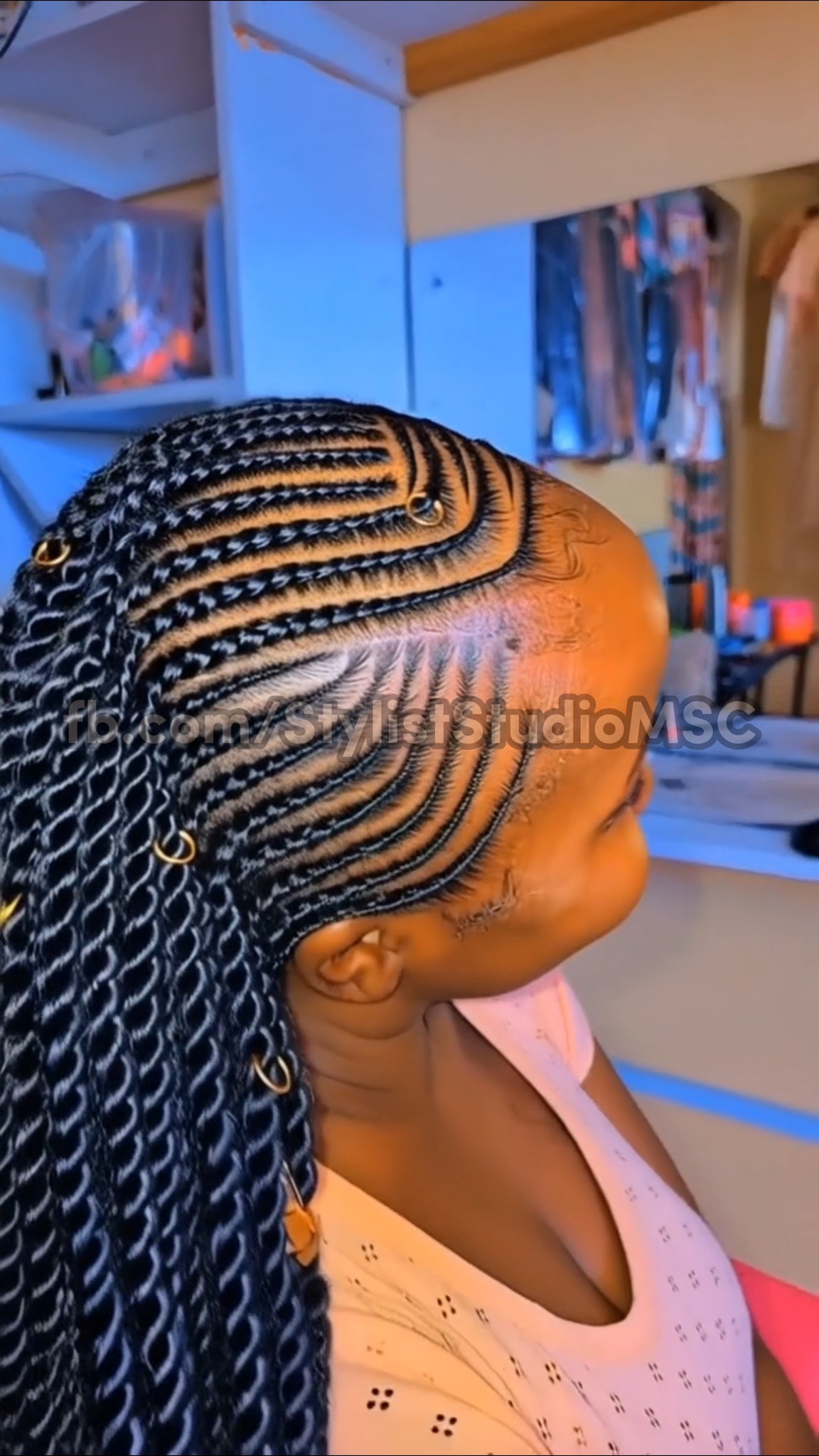 Curved feed-in cornrows styled into side-swept twists with clean scalp ...