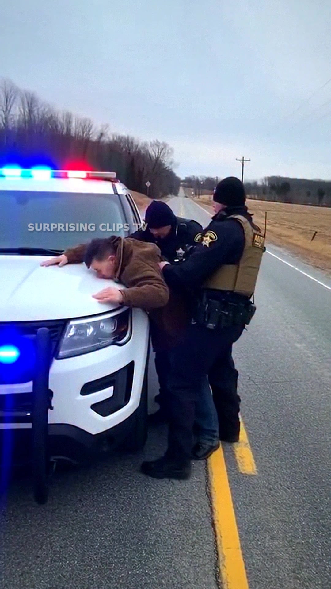 A routine traffic stop unfolds along a quiet mountain highway as a ...
