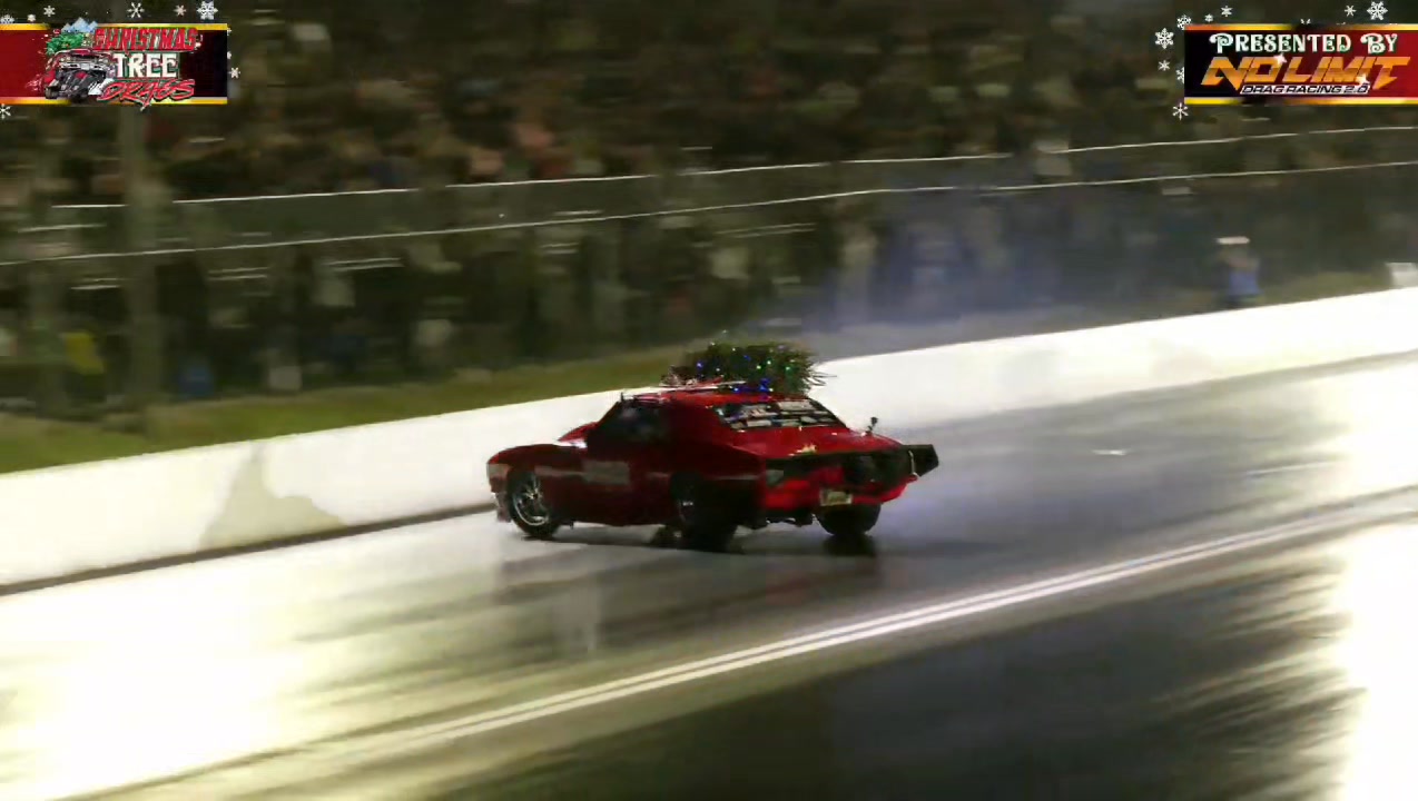 Ron Rhodes with a scary ride at the Christmas Tree Drags, driver is out ...