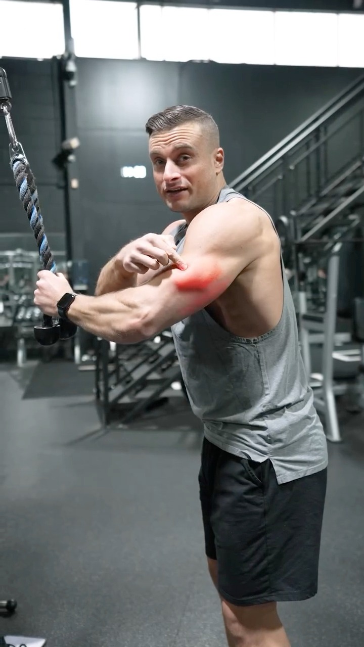 If you set the cable up high, grab the rope with a neutral grip and ...