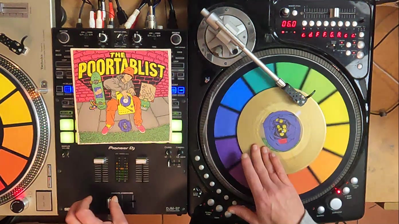DJ Woody practicing with his new 7” The Poortablist over 