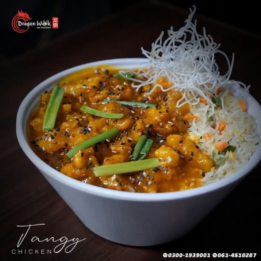 That perfect bite! 🍚🍗 Our Tangy Chicken is a symphony of sweet, spicy ...