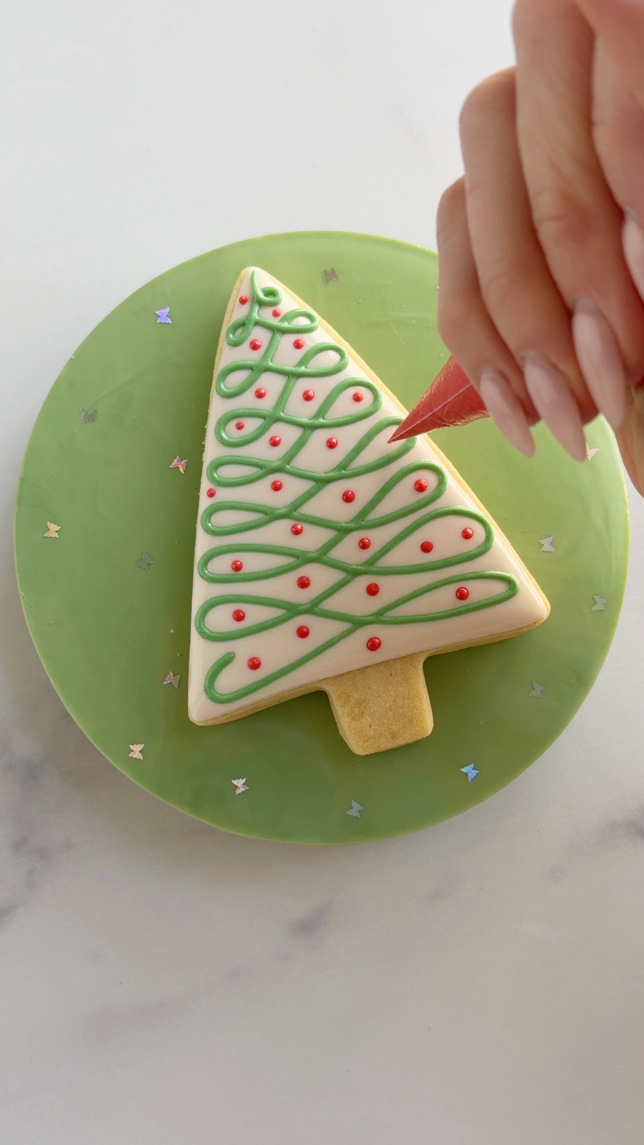 Soak up the of peace watching this soothing Christmas tree cookie