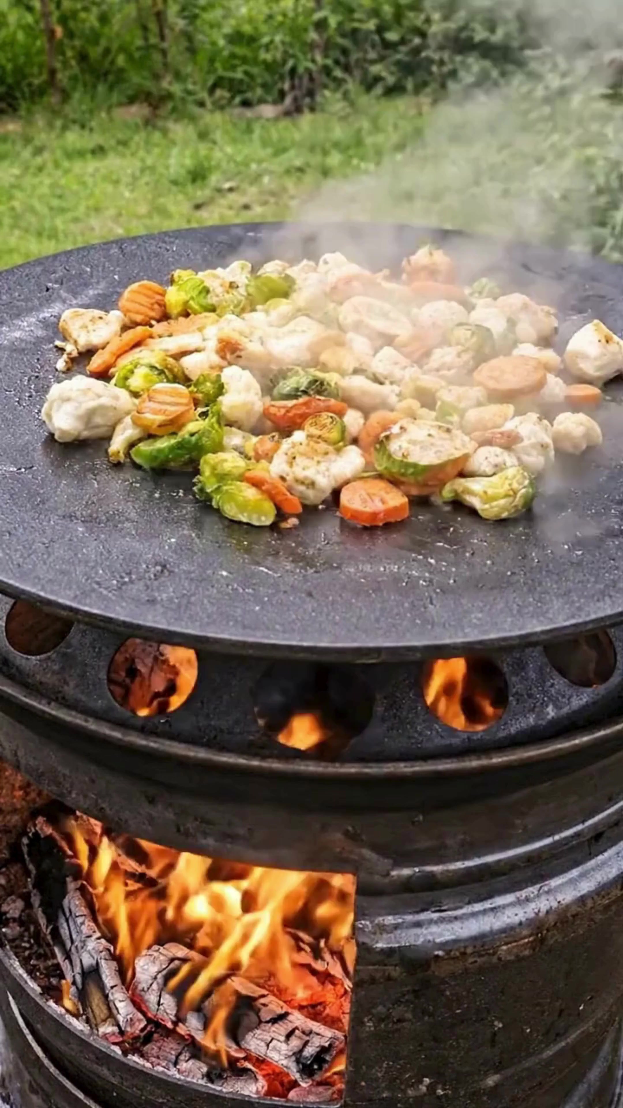 The DIY Rim Fire Pit Stove: A Powerful Backyard Heating Idea This image ...