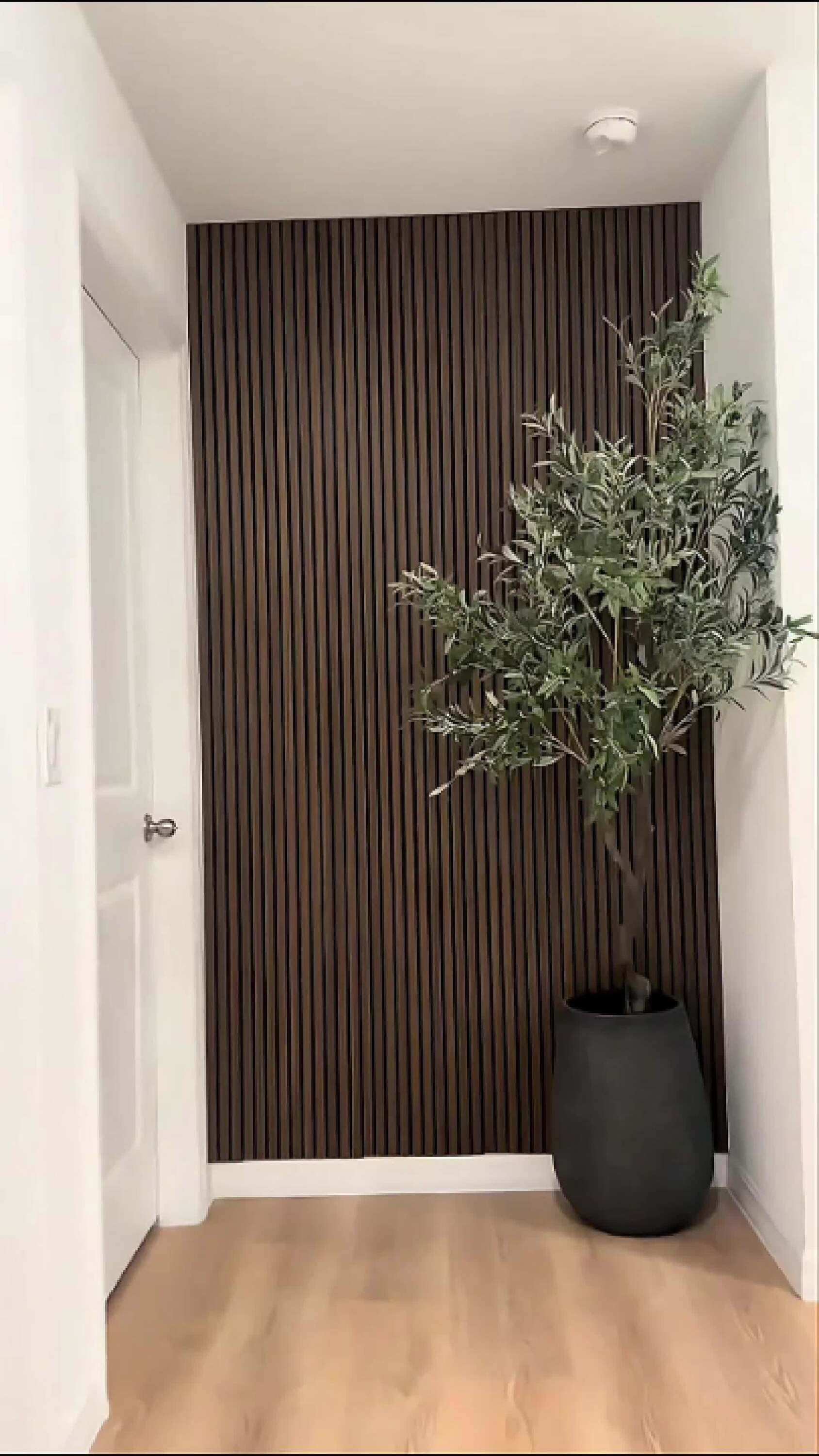 Picture of This peel-and-stick faux wood paneling is the easiest DIY ever. It ...
