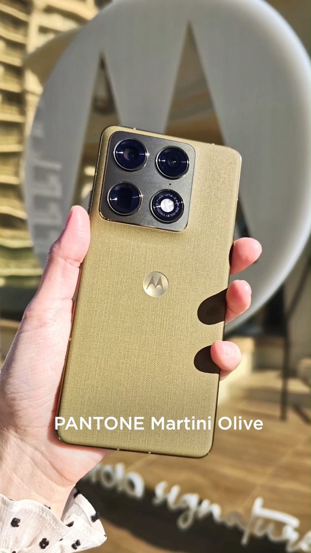 This is Motorola Signature in PANTONE Martini Olive (Gold