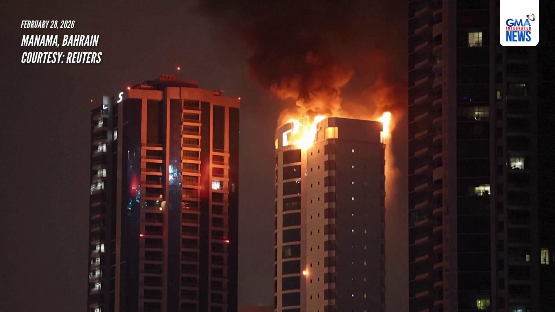 A fire was seen raging through part of a residential building in ...