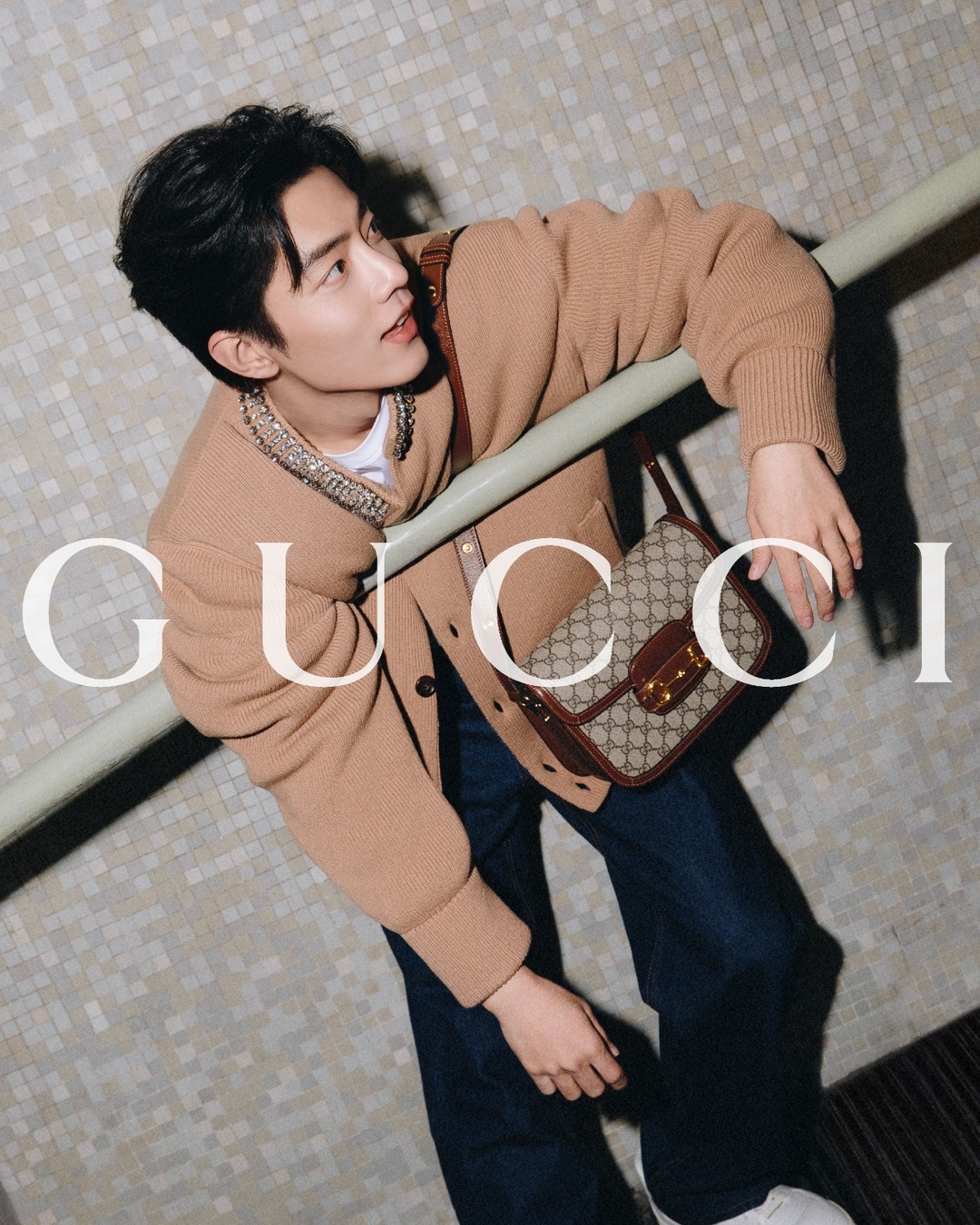 Captured with the Gucci Diana bag—a statement piece defined by its