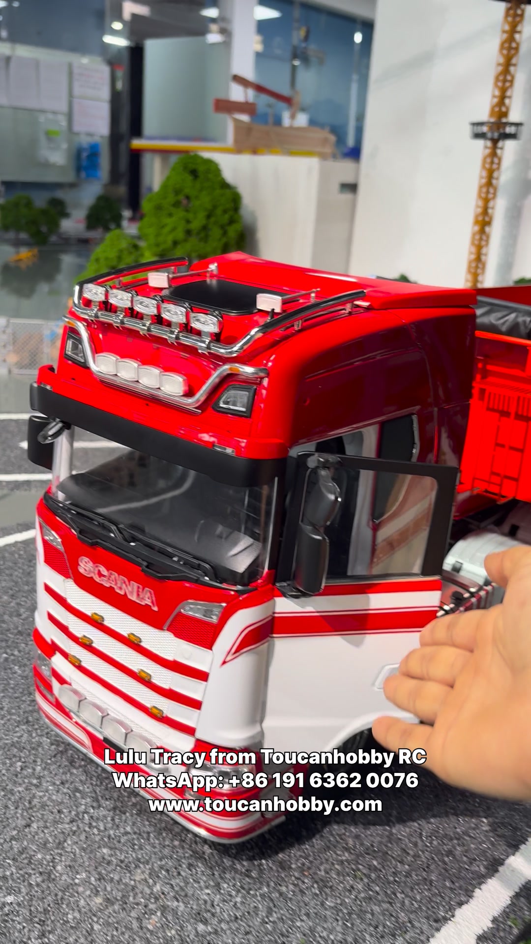 The 1:14 scale Scania 770s 6x6 tractor truck in red and white