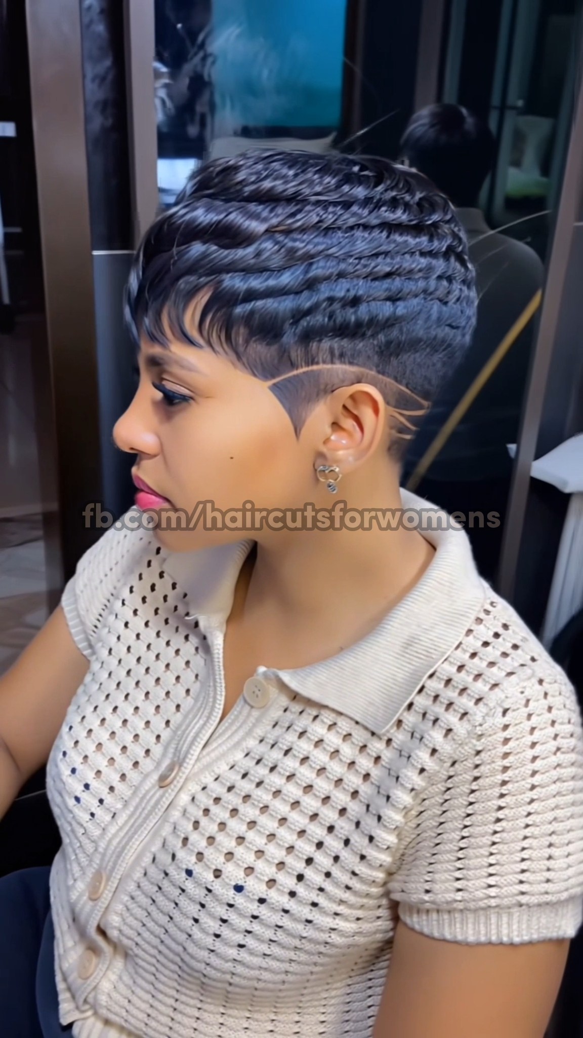 Layered pixie cut with clean razor lines carved along the back. # ...