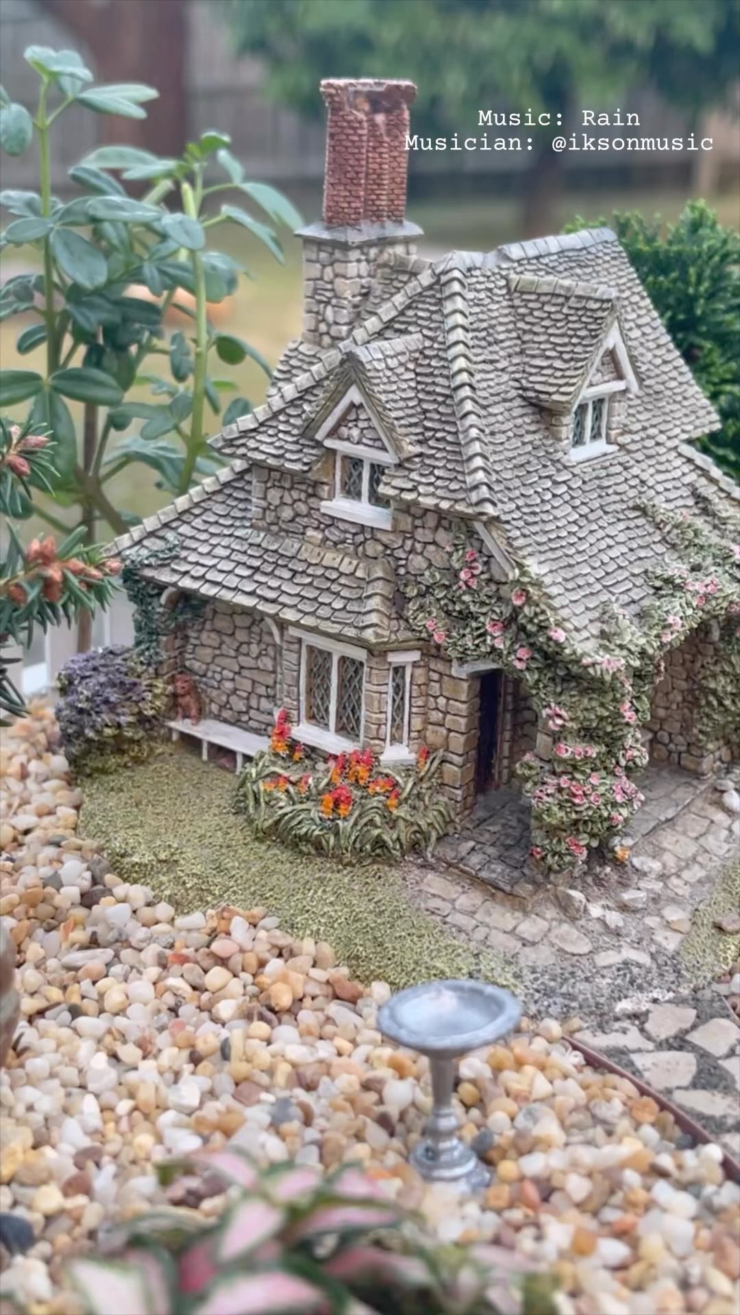 Mini garden with Lilliput Lane houses and polymer clay bridges