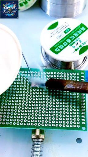 The video displays an electronics hobbyist or technician in the process ...