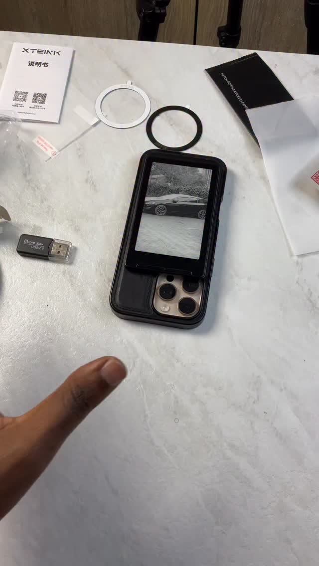 XTEINK X4 Reader: How it attaches to the back of iPhone 16 Pro Max