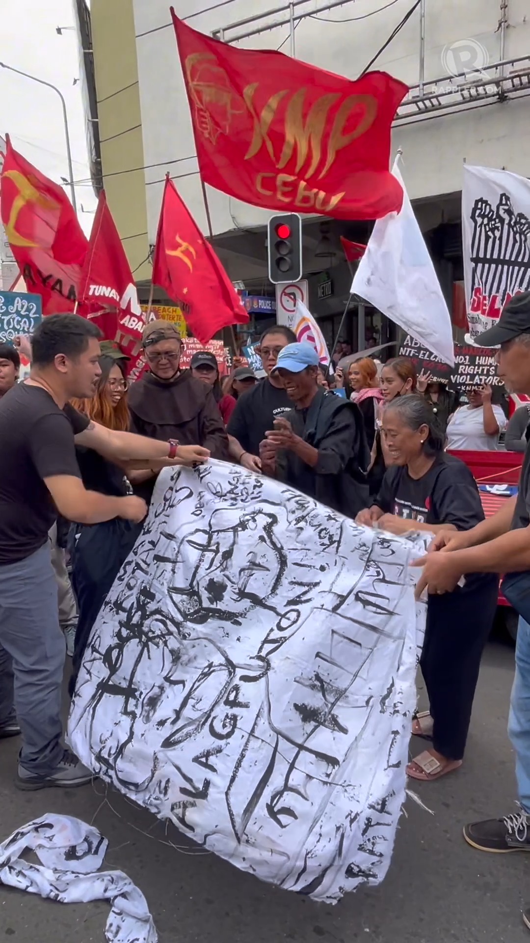 Rappler - Protesters in Iloilo City take to the streets on Wednesday ...