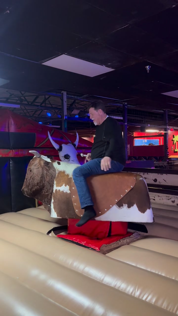 John riding the bull | The Reo Palm Isle | Facebook