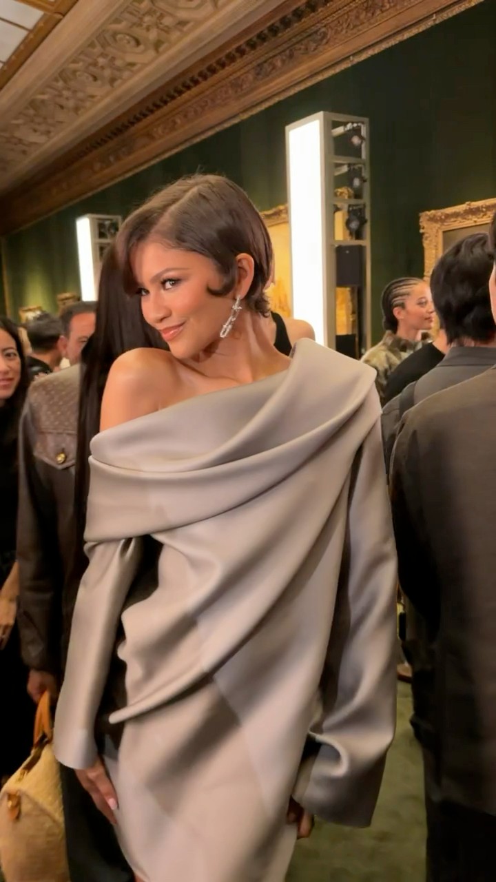 zendaya grey dress in Gray Off-the-Shoulder Minidress at Louis Vuitton Resort 2027 Show NYC tomboy zendaya casual outfits