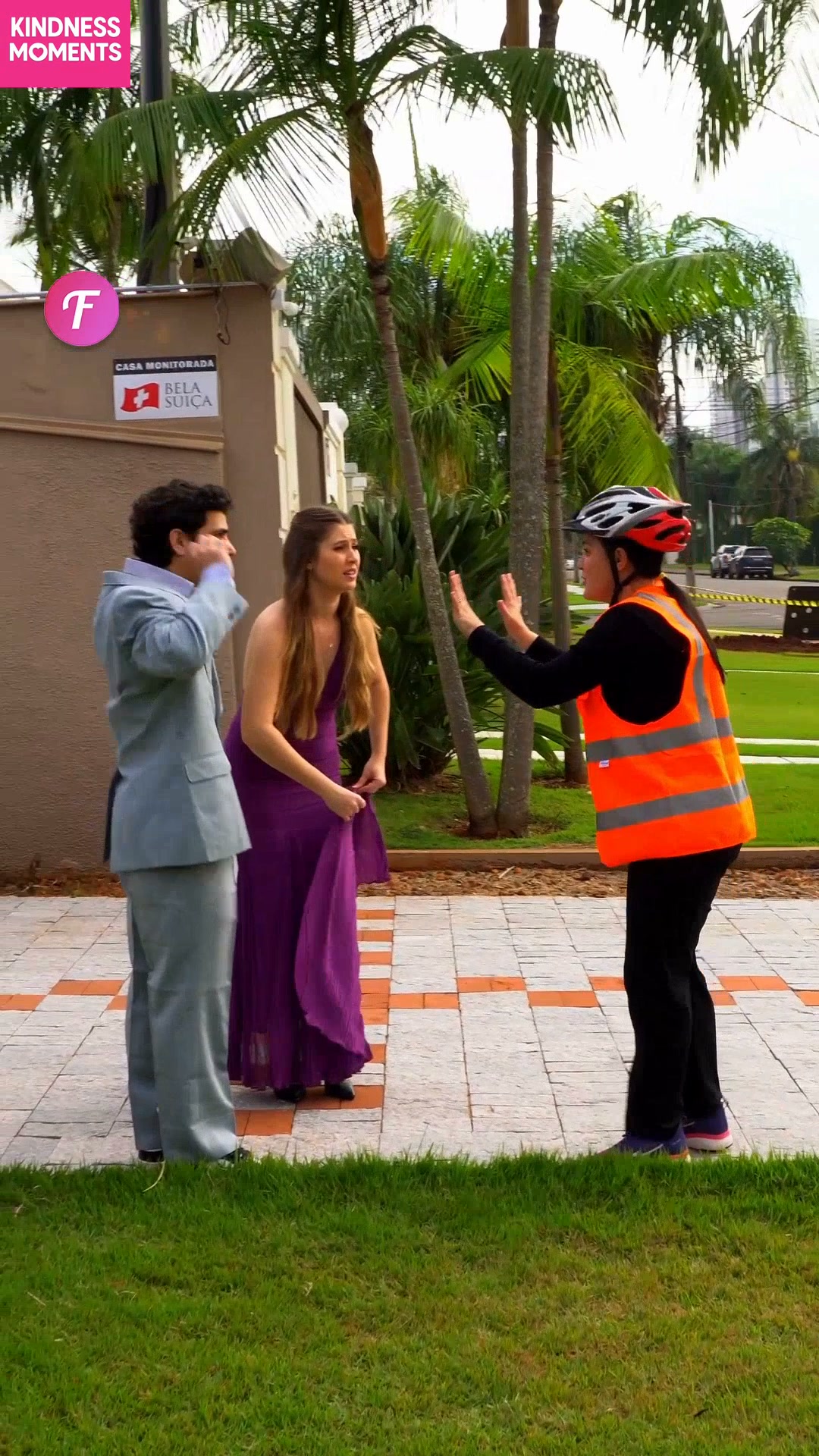 grey suit with purple dress Surprising Help for a Wardrobe Slip-Up, A woman in a and a man in a gray are enjoying their time together when the woman has a wardrobe malfunction. The man tries to help but does lime green one shoulder dress