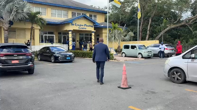 PLP Senator Randy Rolle arrives at party headquarters amid reports that ...
