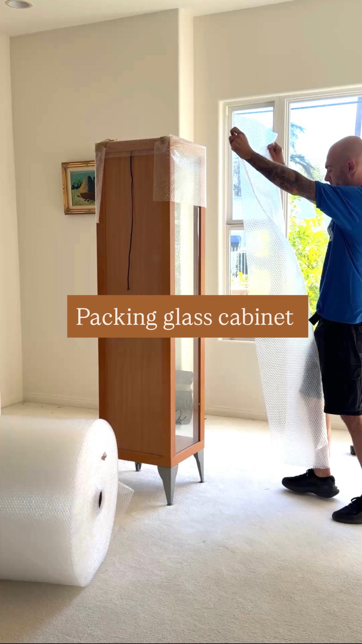 📦✨ Packing a glass cabinet the right way!, When it comes to moving fragile furniture, protection is everything. Our team carefully wrapped this glass display cabinet with bubble wrap and protective
