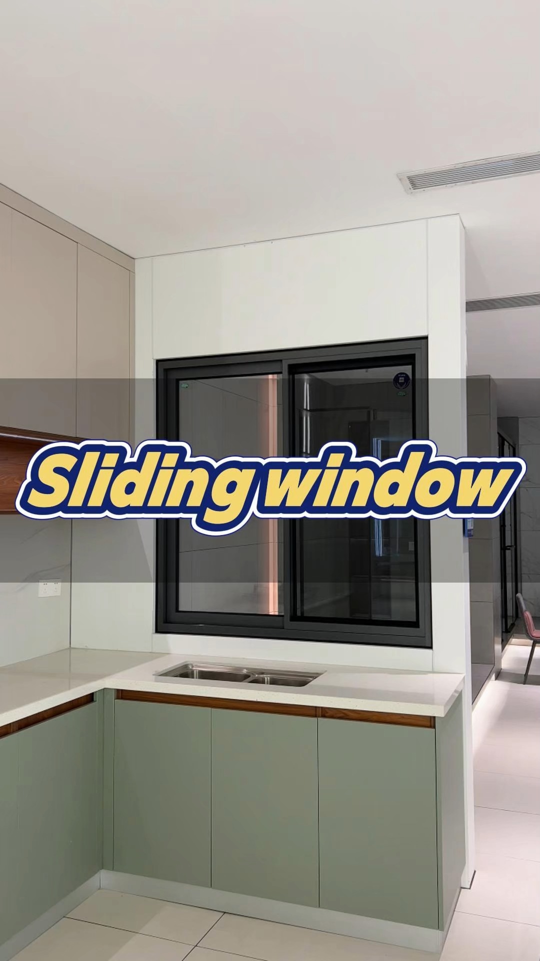 This kitchen sliding window features a sleek frame design and a fine ...