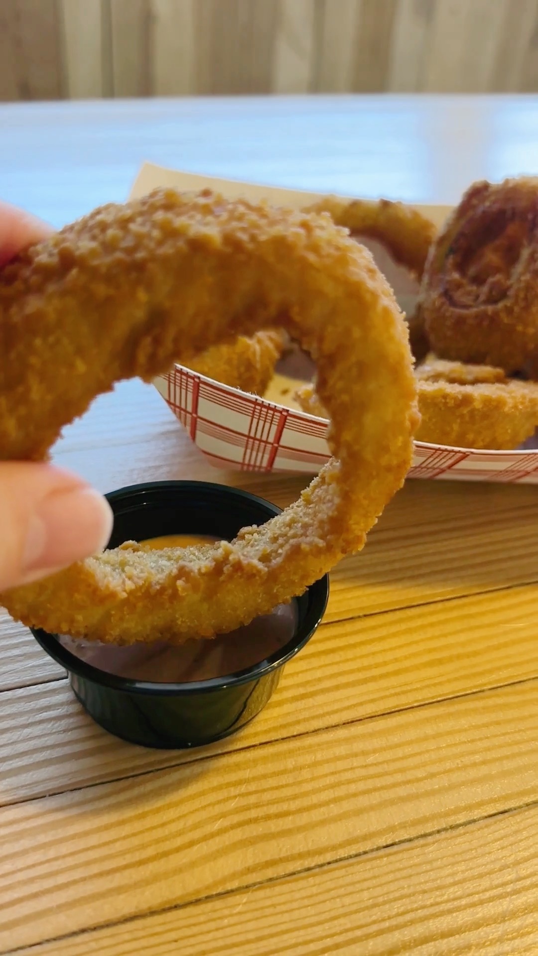 That's a big onion ring!! They're not all that big, but there are ways ...