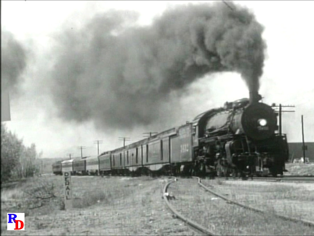 An assortment of Santa Fe steam locomotives, including a great ...
