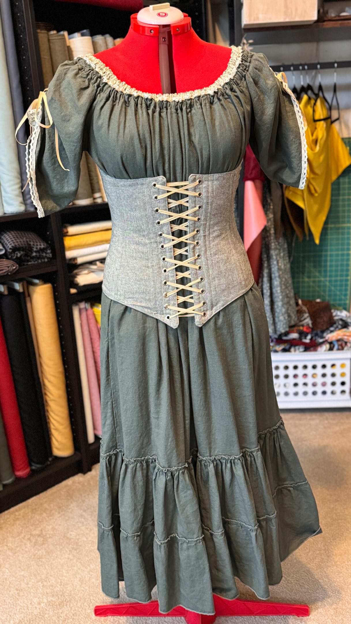 This is one of my most favorites! A lightweight floral cotton underneath a most wonderful linen dress. This one is topped with an underbust corset however it could be paired with a smaller corset belt 