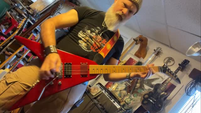 Epic guitar. I took an impossible to find ESP made JK6000 Flying V