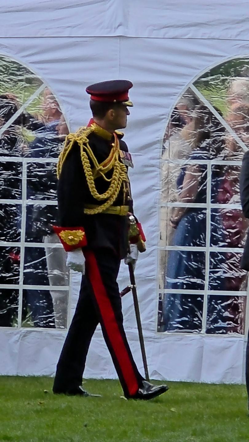 Stepping Out in Full Ceremonial Dress 🇬🇧, A distinguished British military officer, wearing impressive gold aiguillettes and carrying a sword, is seen on duty during the ceremonial events on Saturday, 