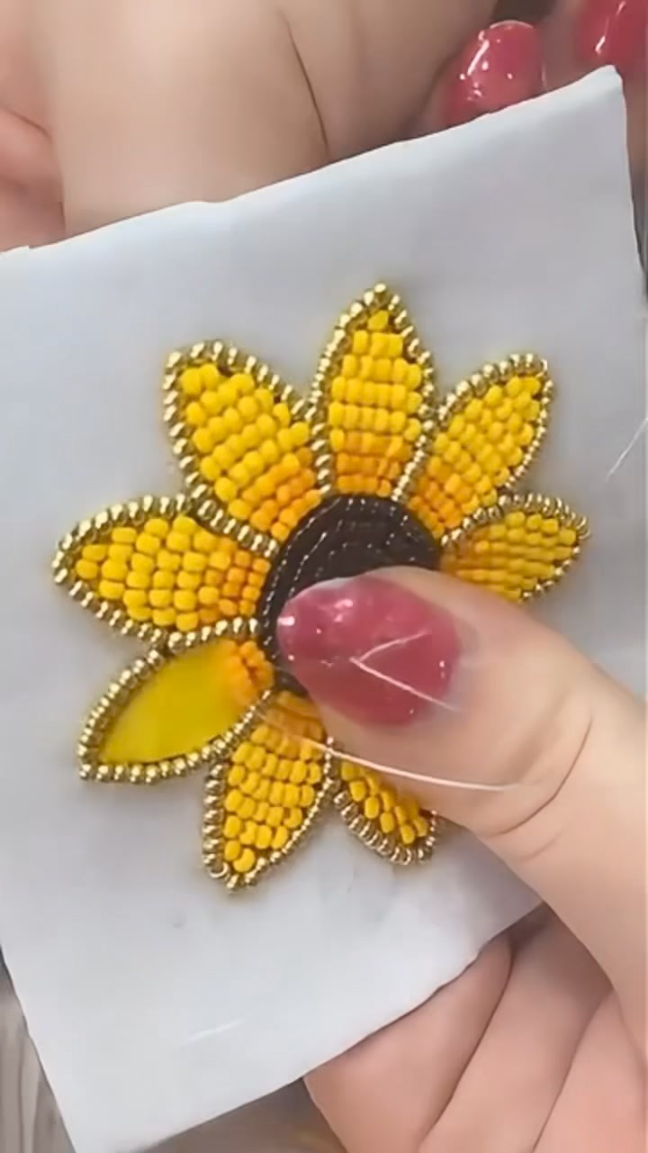 Beaded Sunflower 🌻 💛 , In the embrace of summer, each bead on a sunflower glistens like a drop of sunlight, crafting a mosaic of warmth and brilliance. , Happy beading! 🌻💛, 📹@Artbybreannadeis,