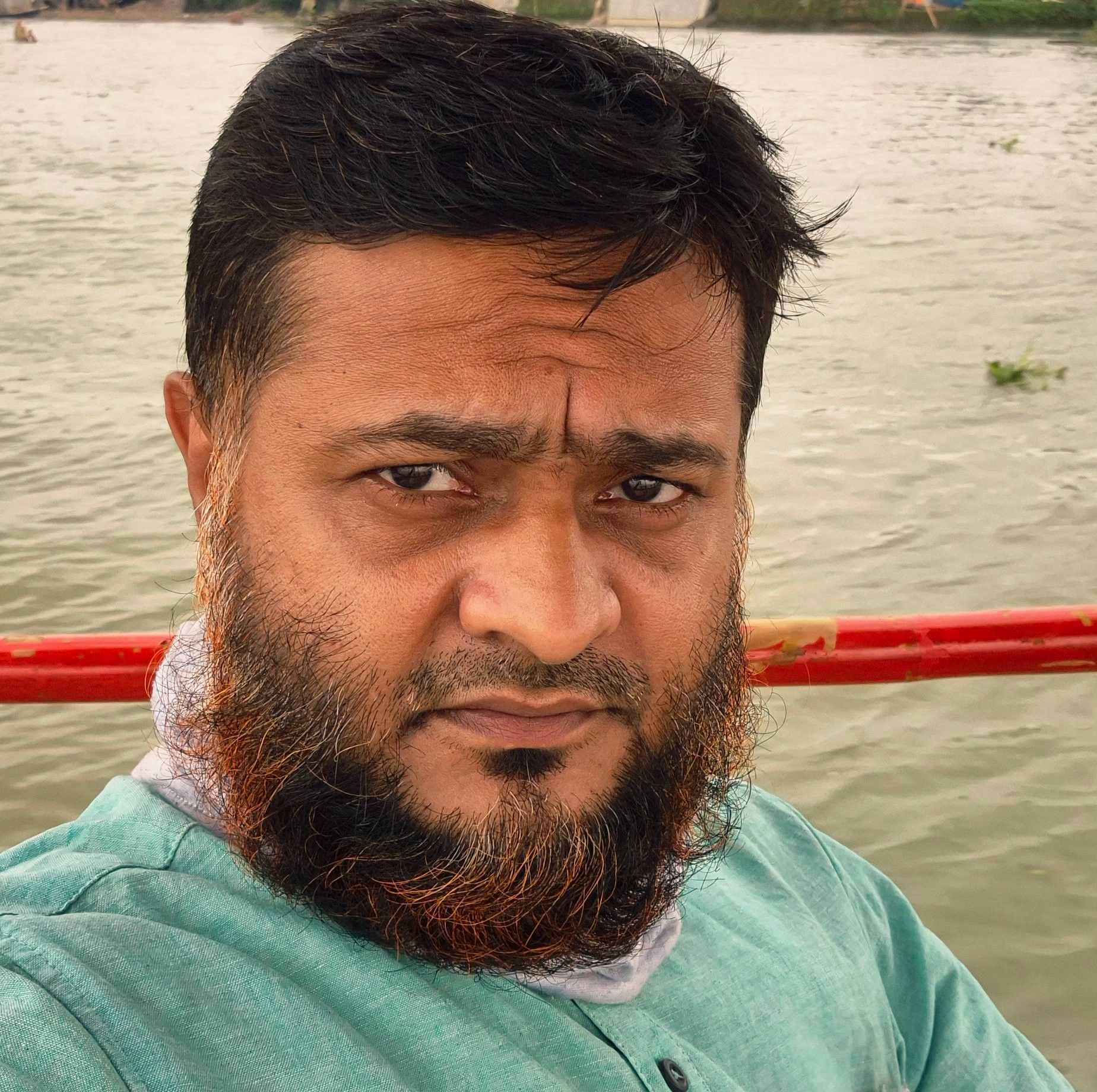 M H Khan