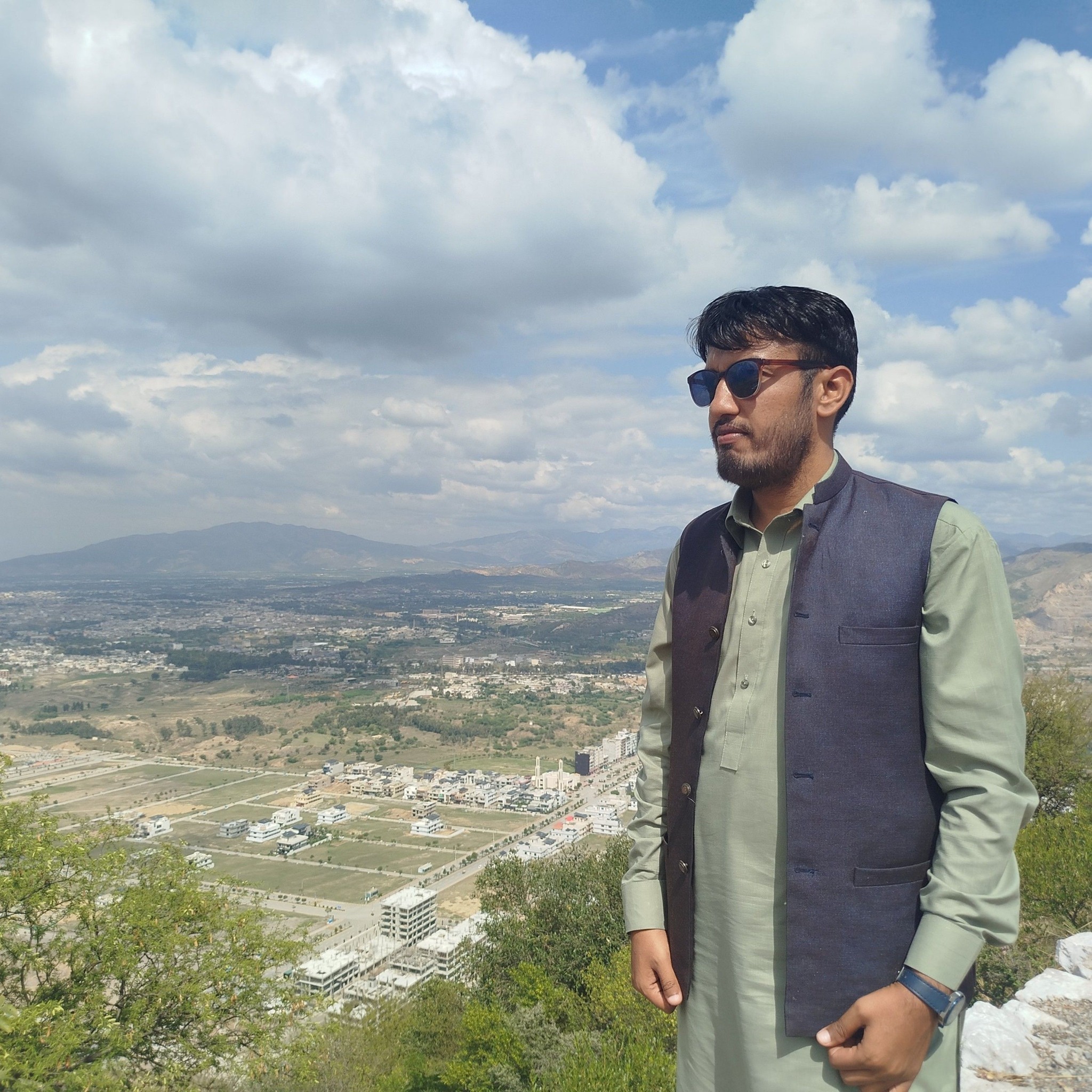 M Basit