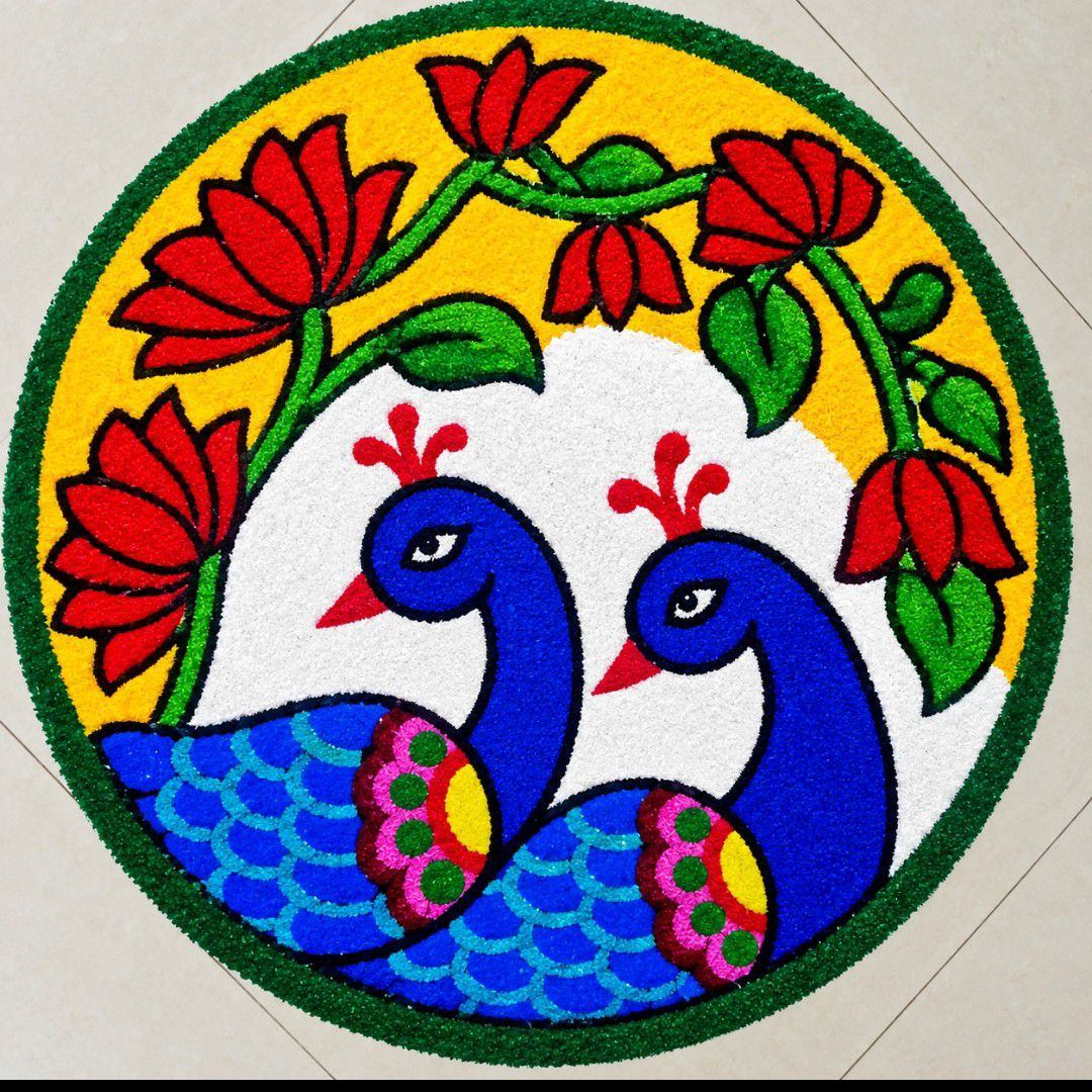Adding a little color to your day with this vibrant peacock rangoli ...