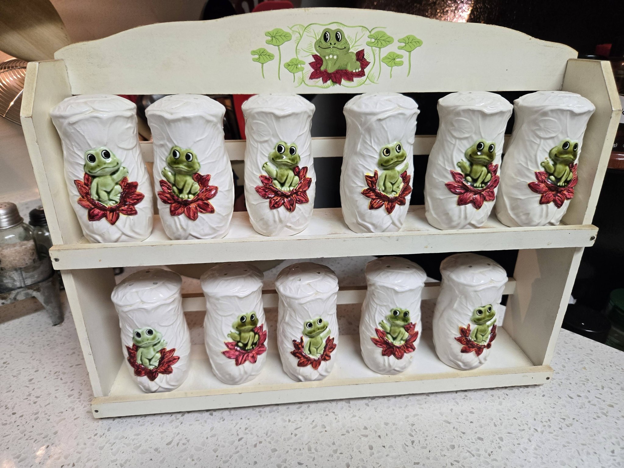 1976 Sears Neil the Frog spice set with rack. Includes rack, 11