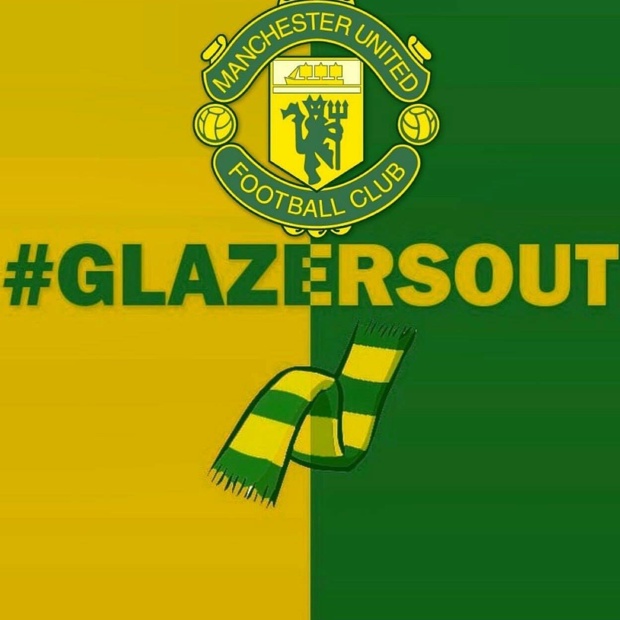 Manchester United fans with a 'Love United Hate Glazer' banner in the