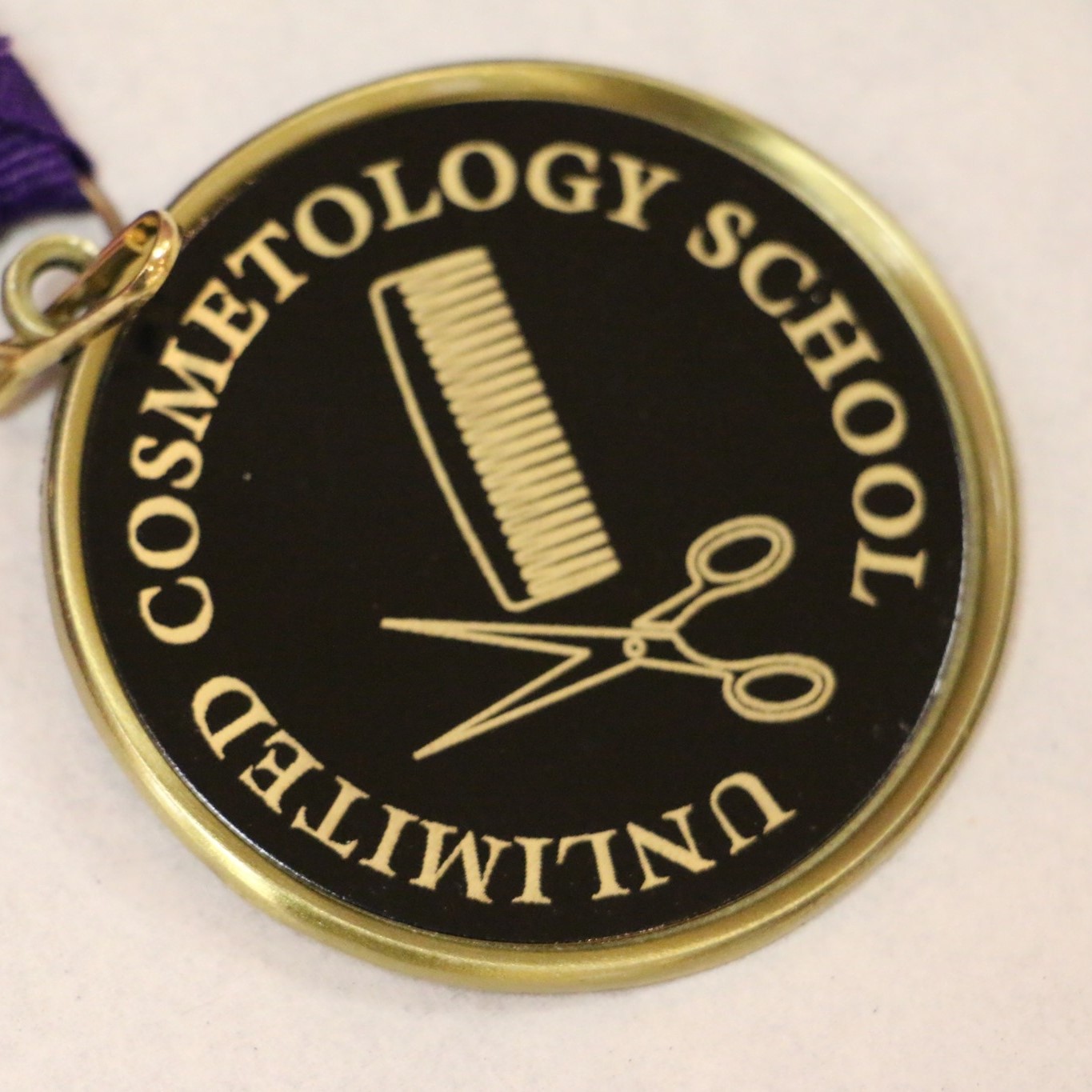 Unlimited Cosmetology School logo