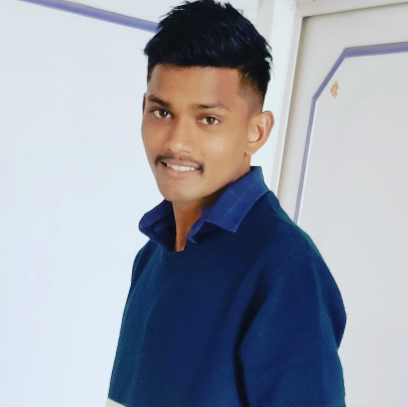 Raja R M