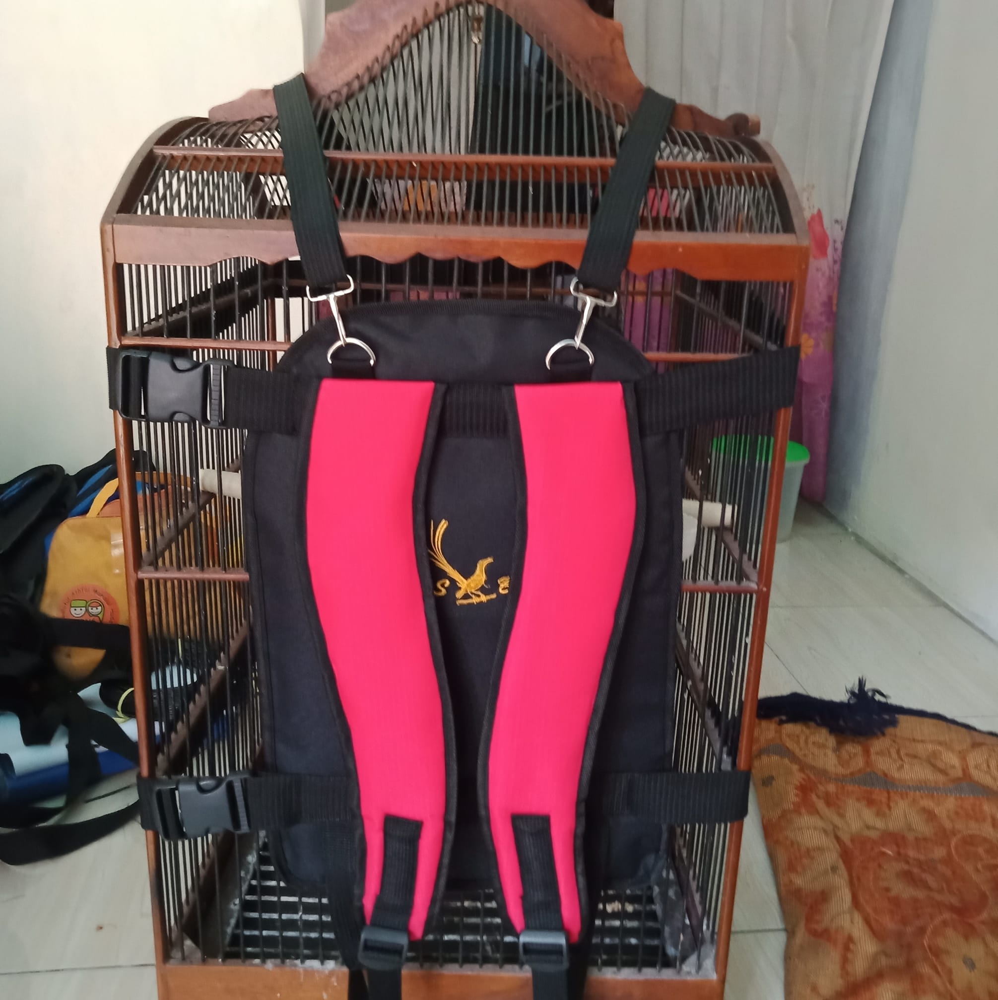 Tas gendong sangkar burung