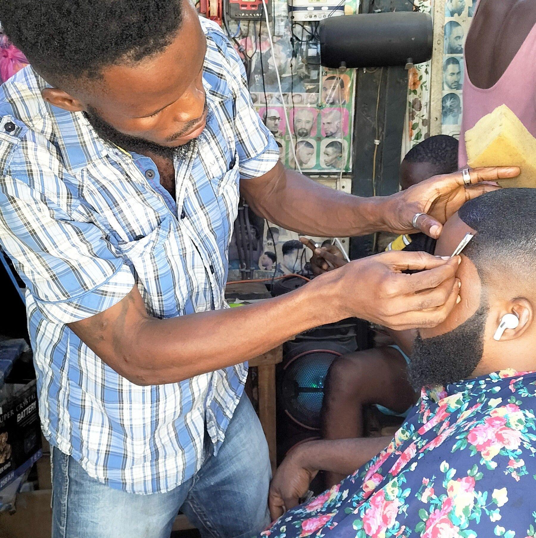 Hazard 10 designers barbing saloon | Freetown