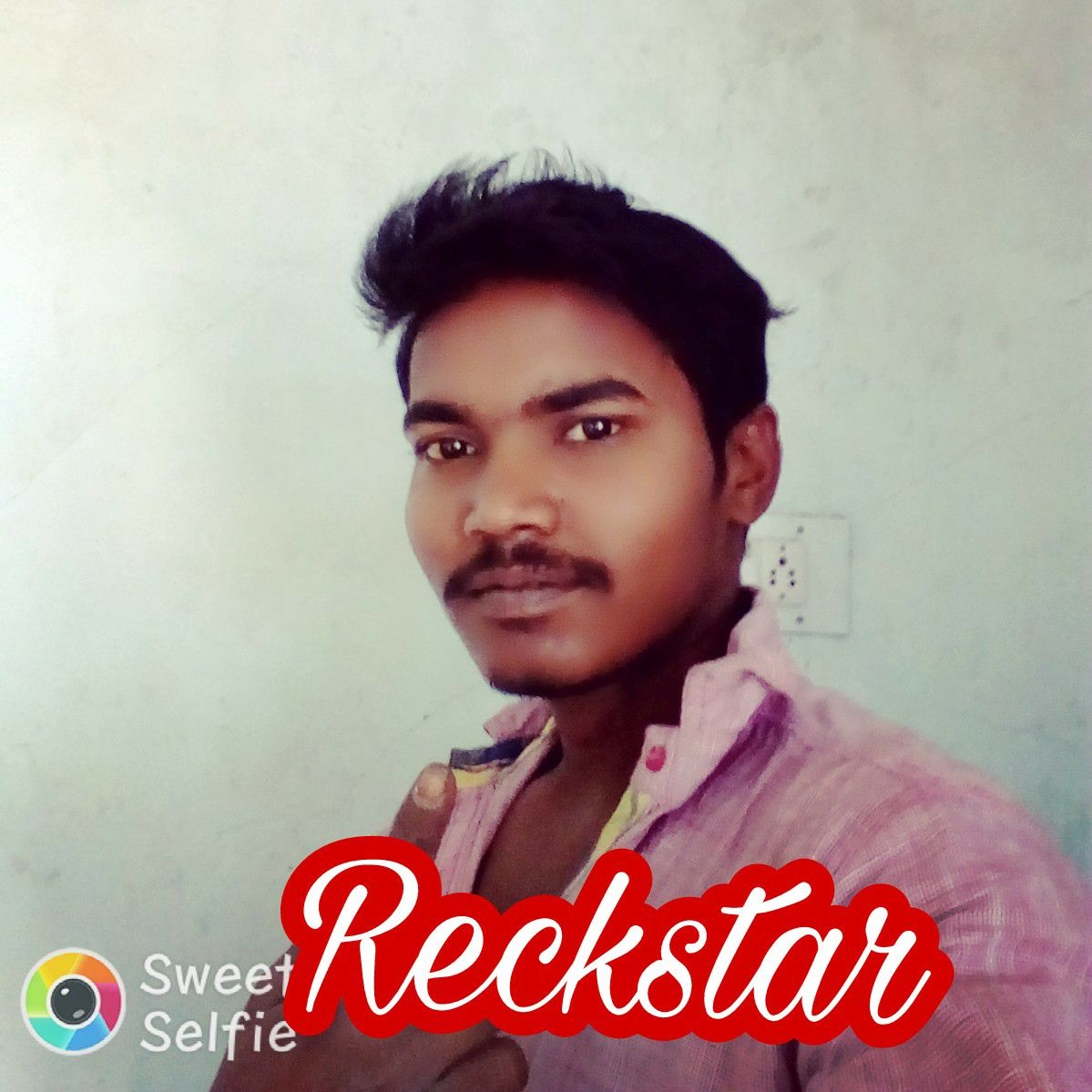 J Ravi