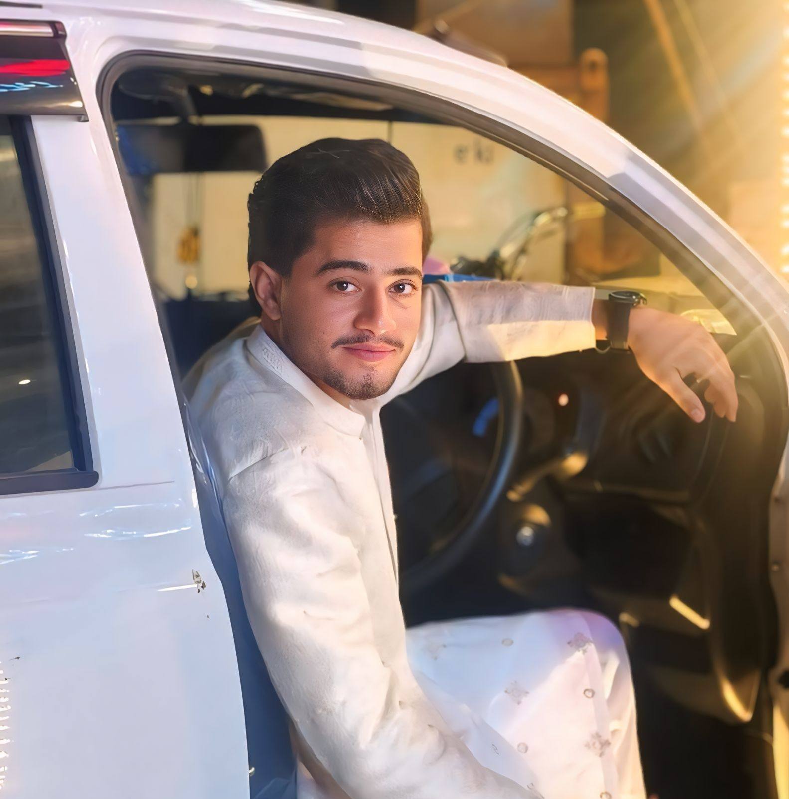 M Ali