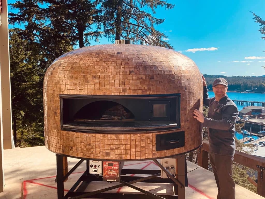 Rotating wood burning brick ovens
