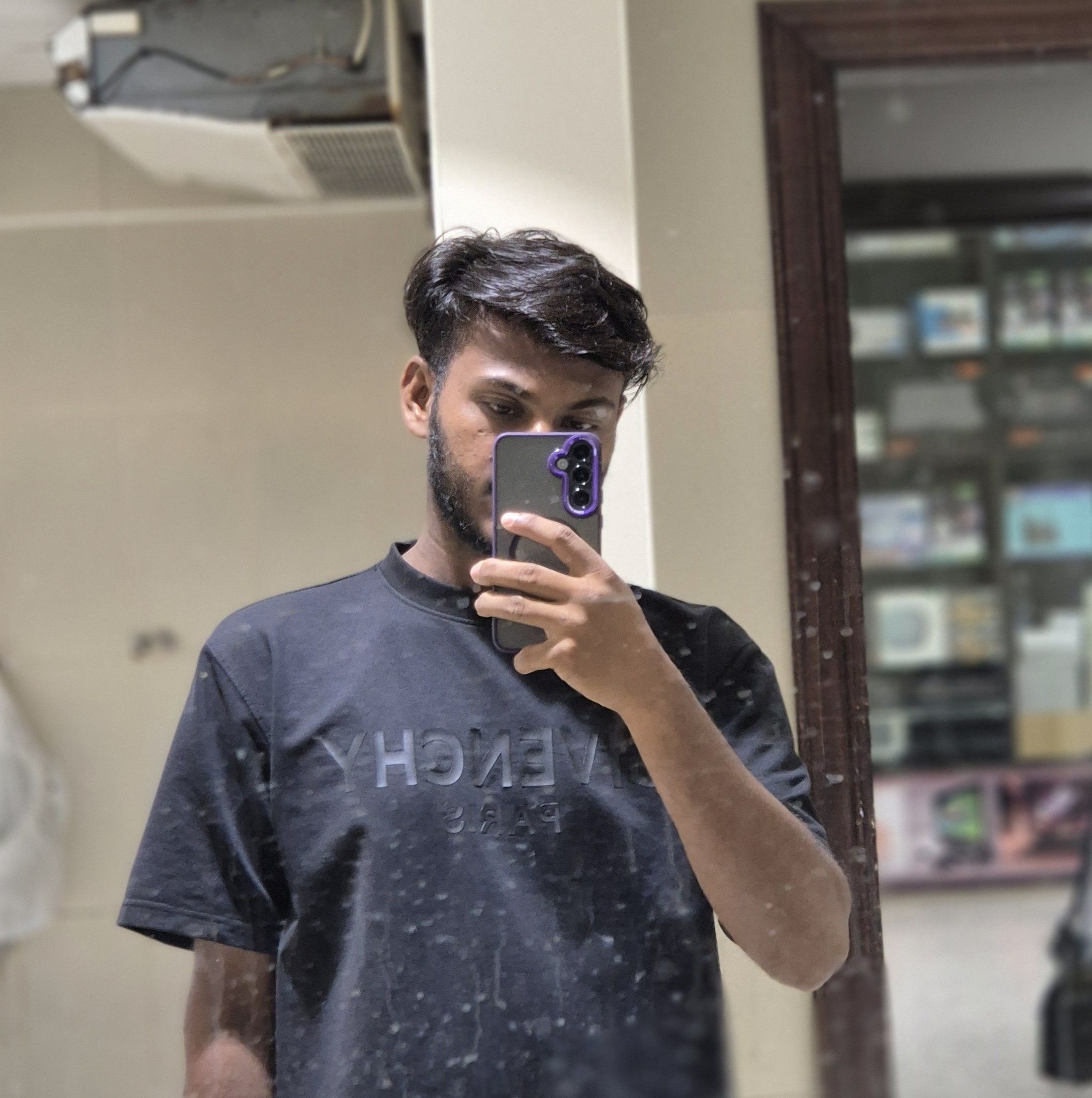 Manik J R