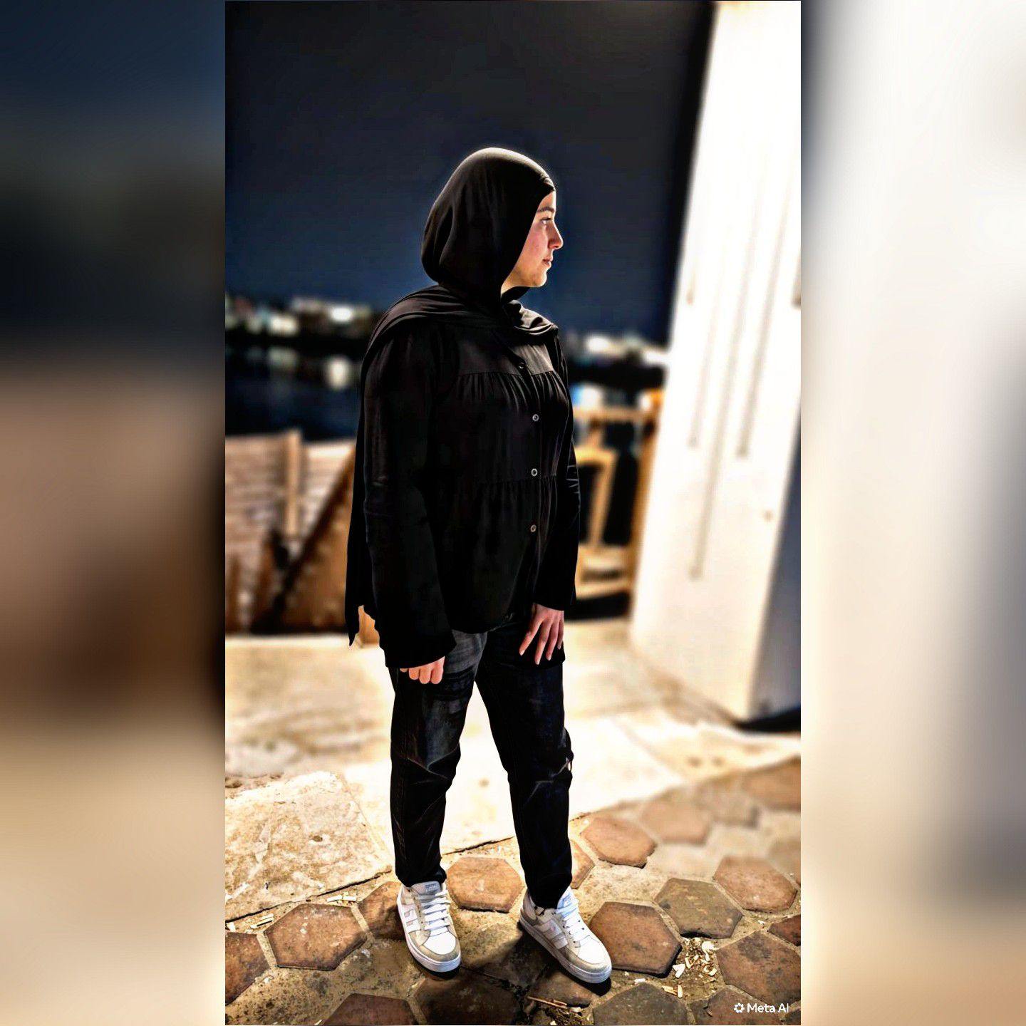 Reem T Qasim