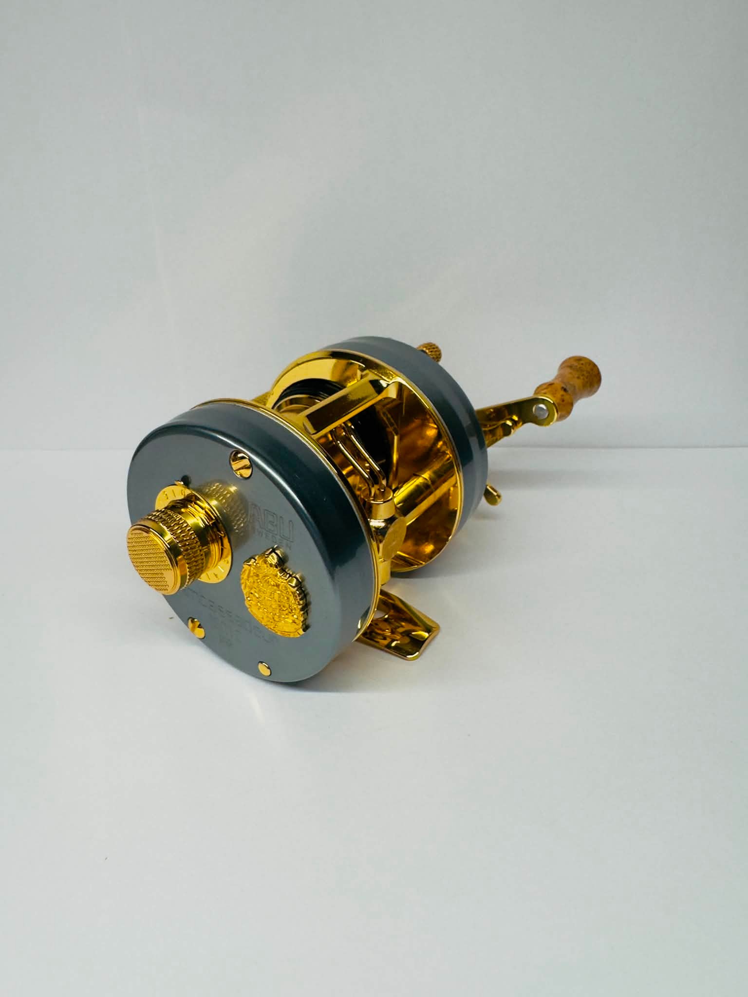 abu garcia gold plated reels 100 Year Anniversary Ambassadeur Reel Genuine Collectors Box 1542739 1.8 ft (4.5 m) Line Capacity Abu Garcia Black And Gold