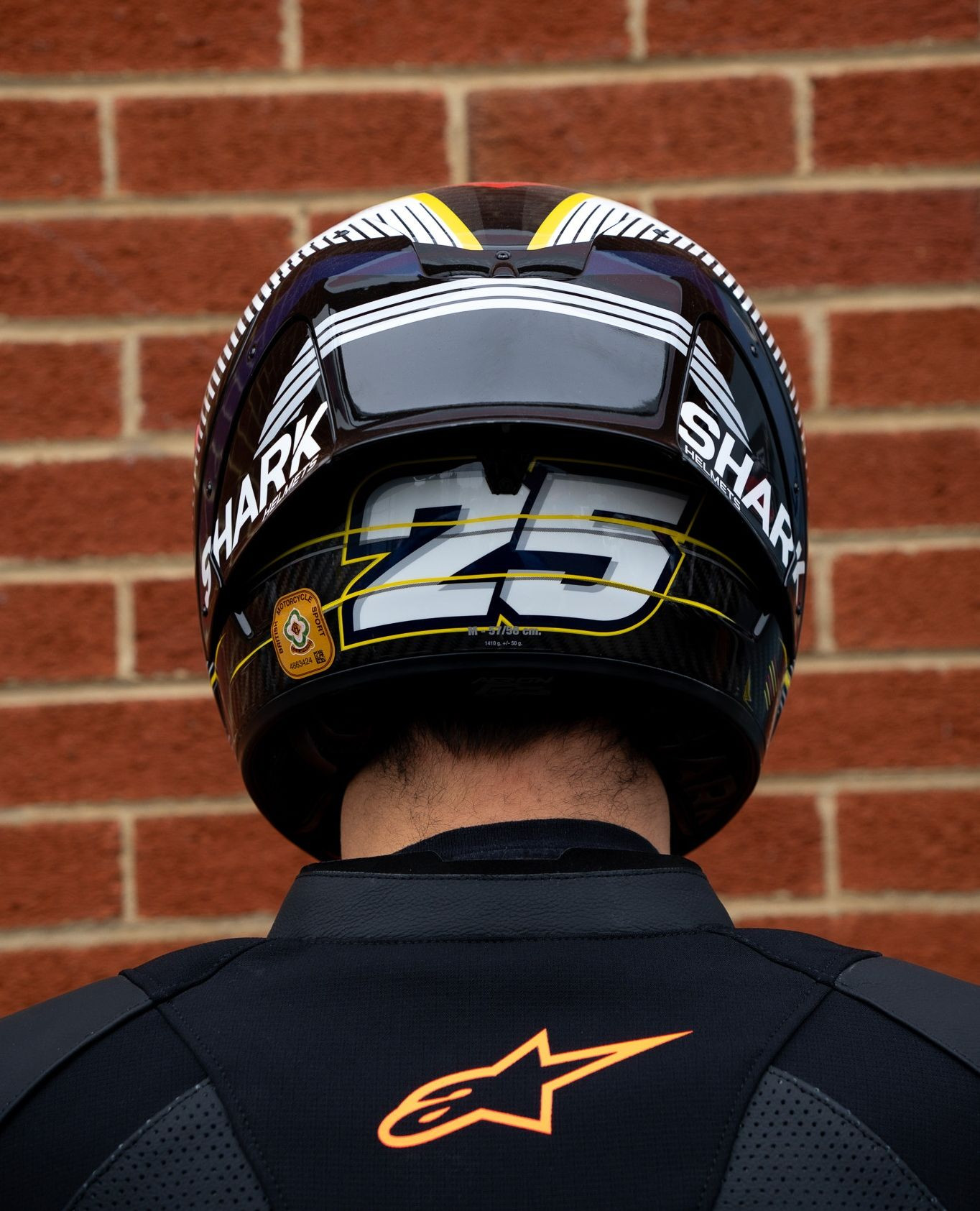 A premium racing helmet built with MotoGP technology and wrapped 