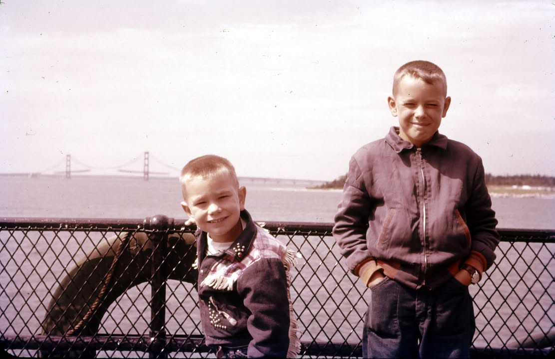 The wonderful family photos on a car ferry with the Mackinac Bridge ...